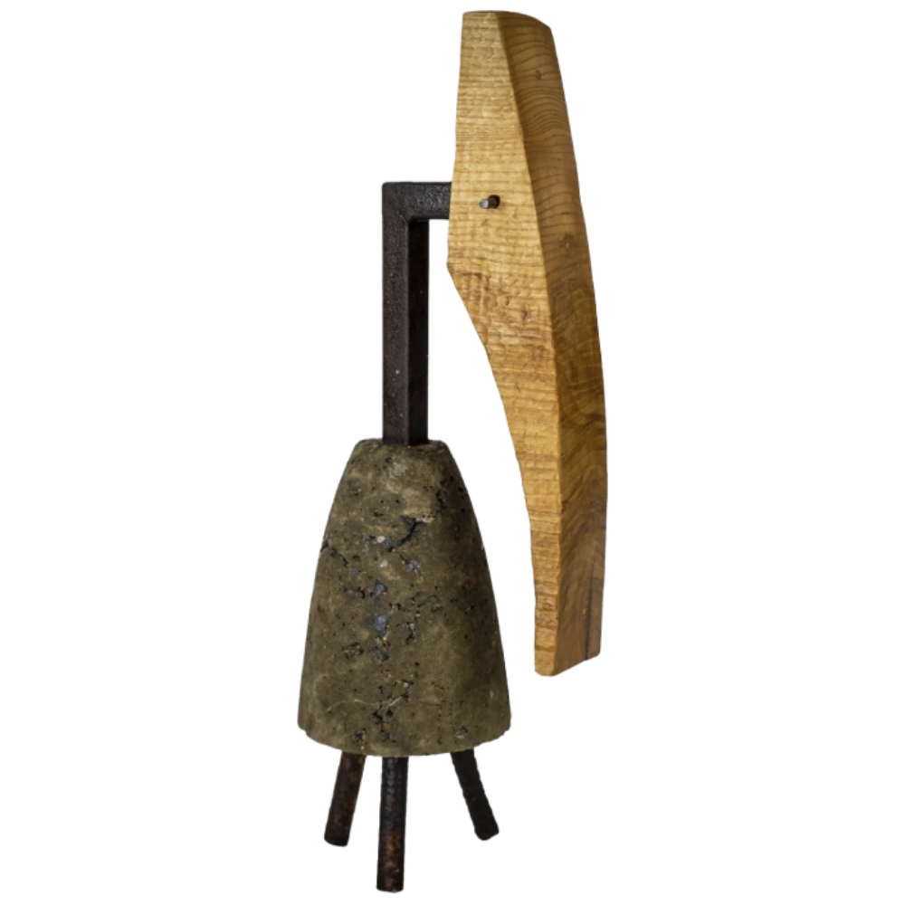 a wooden object with a stone on a stand