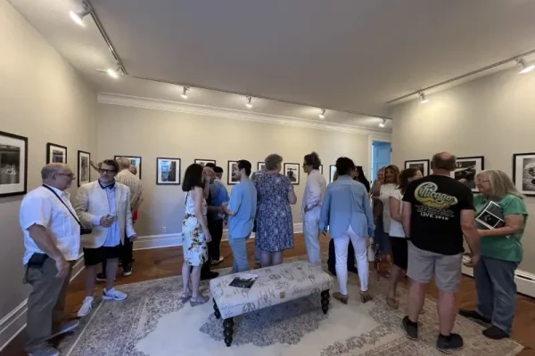 a group of people standing in a room