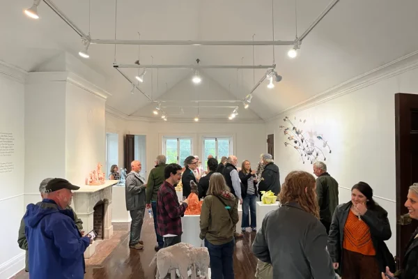 a group of people standing in a room